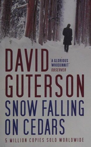 Cover of snow falling on cedars